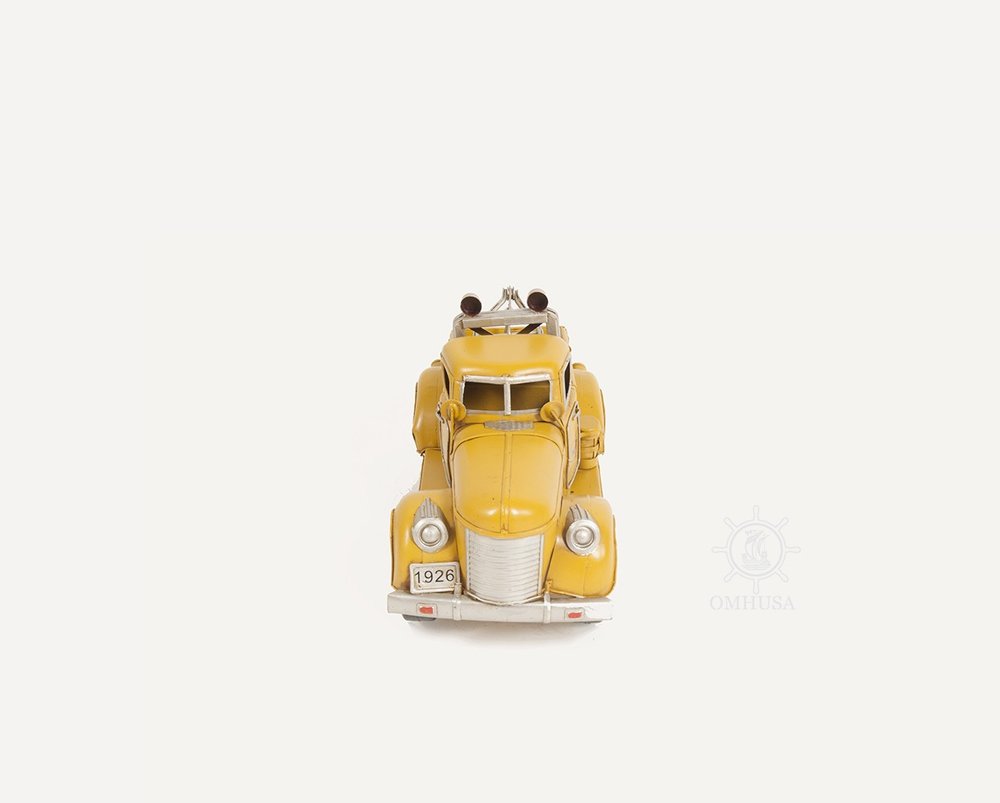7" Yellow Metal Hand Painted Model Car HomeRoots