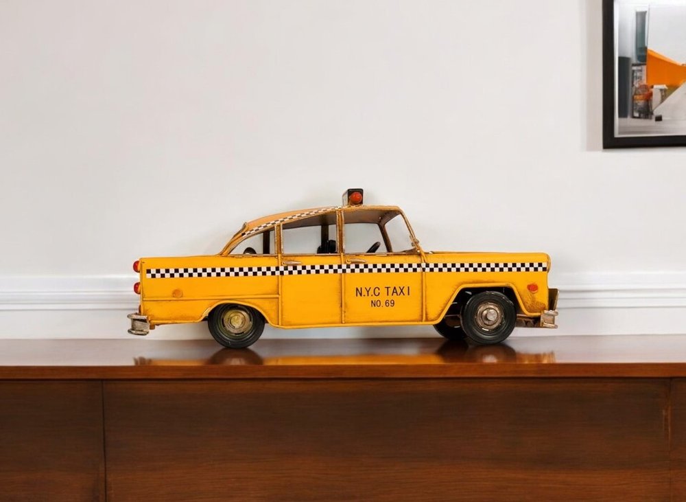13" Yellow Metal Hand Painted NYC Taxi Tabletop Sculpture HomeRoots