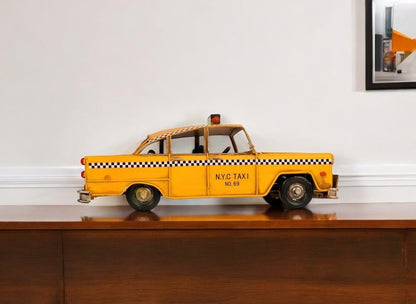 13" Yellow Metal Hand Painted NYC Taxi Tabletop Sculpture HomeRoots