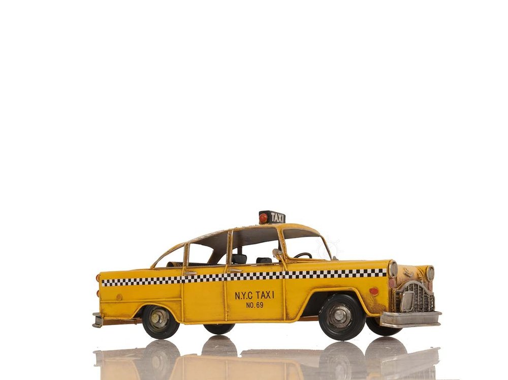 13" Yellow Metal Hand Painted NYC Taxi Tabletop Sculpture HomeRoots