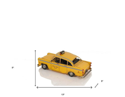 13" Yellow Metal Hand Painted NYC Taxi Tabletop Sculpture HomeRoots