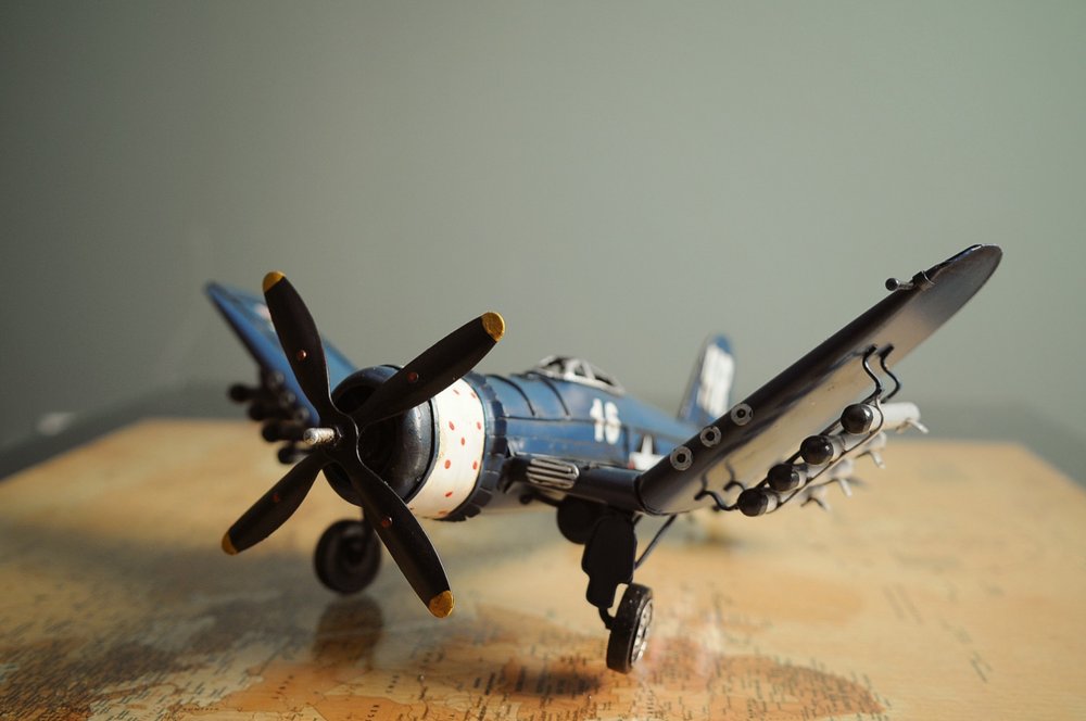 6" Blue Metal Hand Painted Model Airplane Tabletop Sculpture HomeRoots