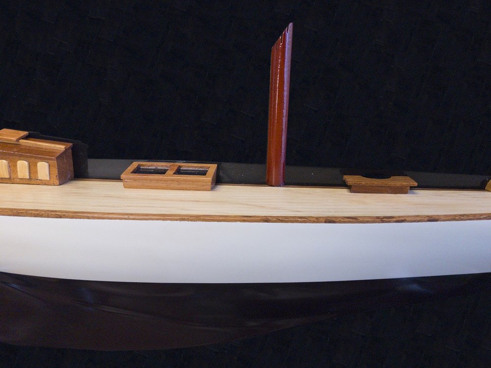 12" Black and White Solid Wood Hand Painted Shamrock V Yacht Half-Hull Model Boat HomeRoots