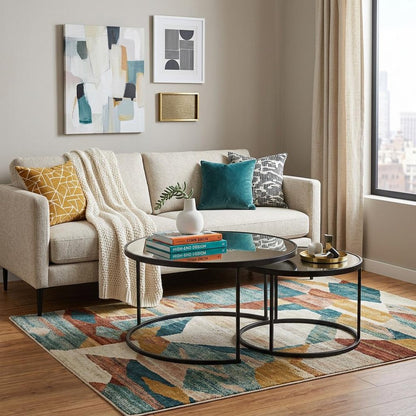 Set of Two Black And Silver Mirrored Round Nested Coffee Table Set HomeRoots