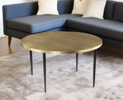 34" Black And Gold Embossed Metal Round Coffee Table HomeRoots