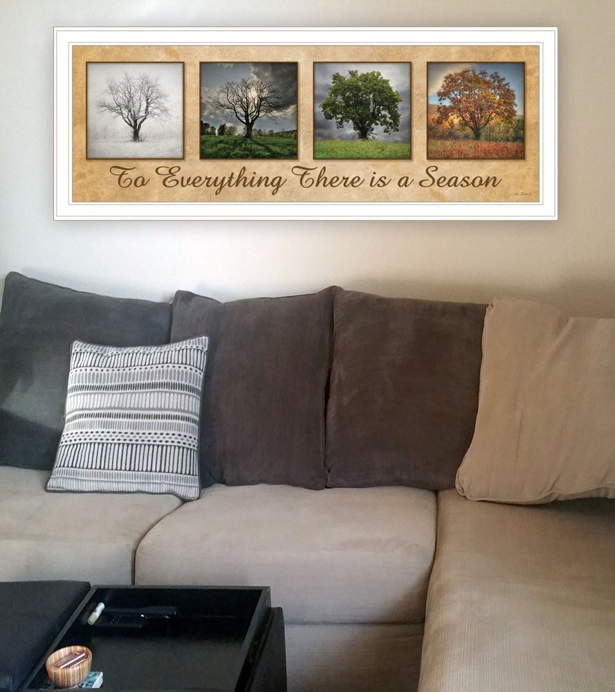 There is a Season 1 White Framed Print Wall Art HomeRoots