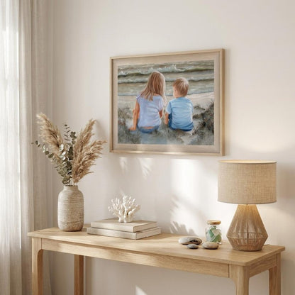 Boy and Girl Sitting in Dunes Brown Framed Print Wall Art