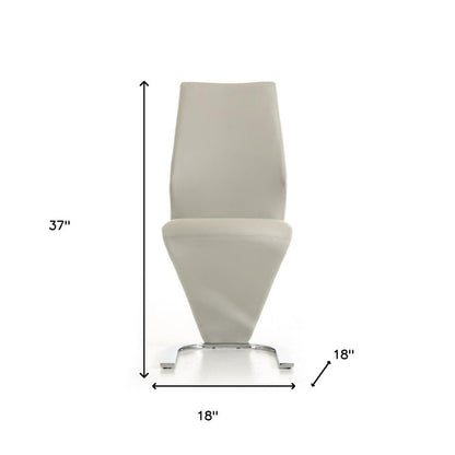 Set of Two White and Silver Upholstered Faux Leather Dining Side Chairs HomeRoots