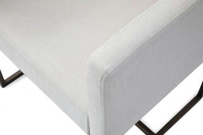 Off White and Antiqued Brass Upholstered Fabric Dining Arm Chair HomeRoots
