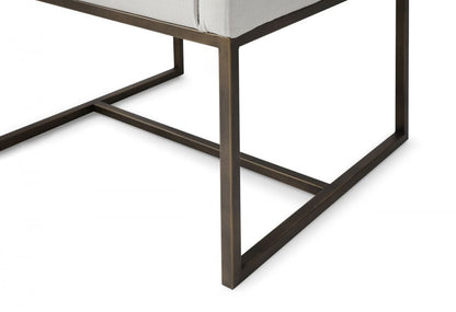 Off White and Antiqued Brass Upholstered Fabric Dining Arm Chair HomeRoots