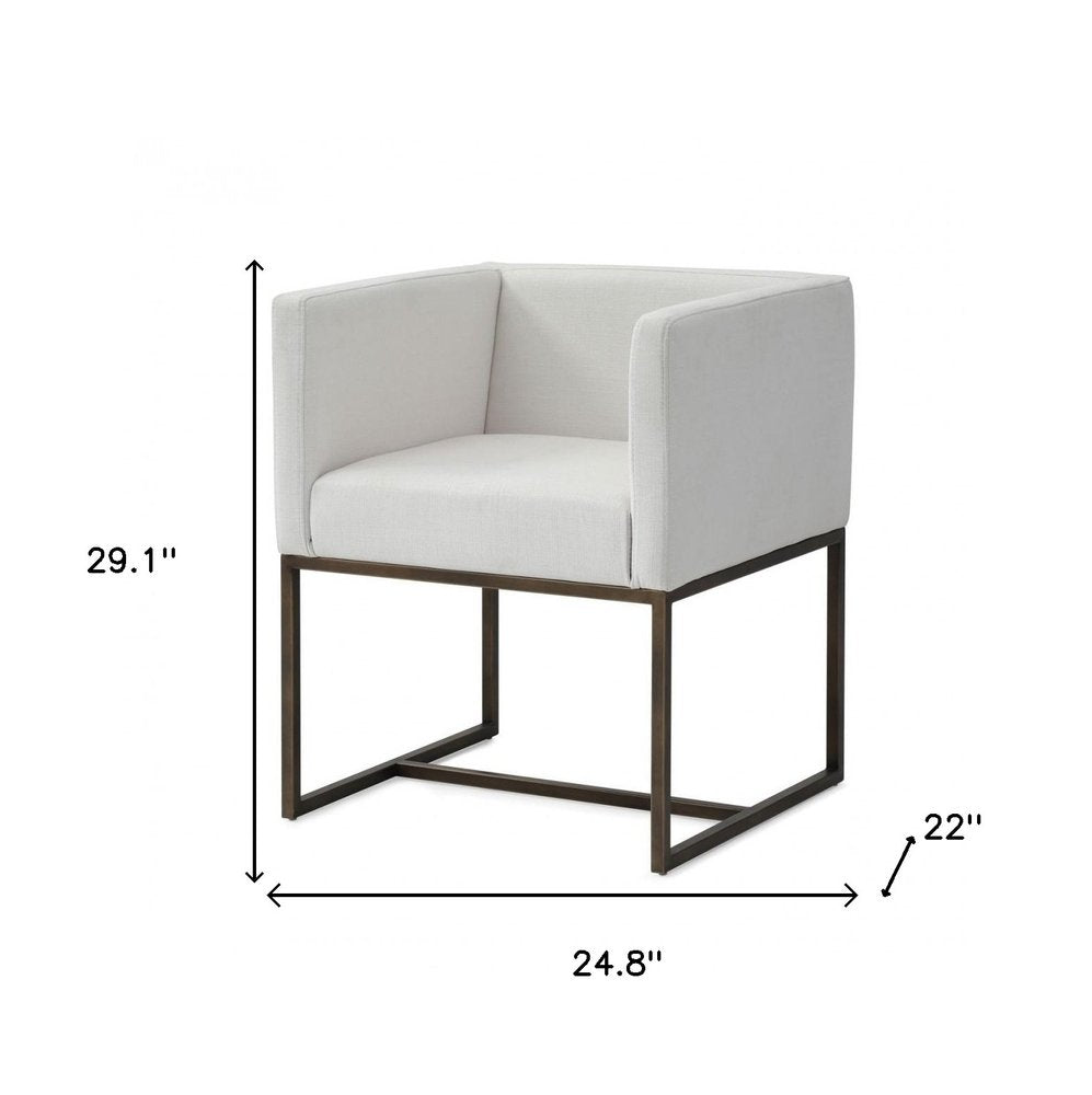 Off White and Antiqued Brass Upholstered Fabric Dining Arm Chair HomeRoots