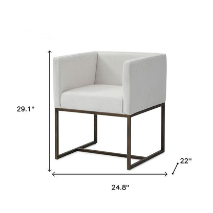 Off White and Antiqued Brass Upholstered Fabric Dining Arm Chair HomeRoots