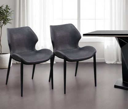 Set of Two Gray and Black Upholstered Faux Leather Wing Back Dining Side Chairs HomeRoots
