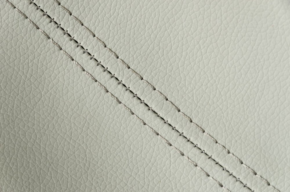 29" Light Gray And Silver Faux Leather And Stainless Steel Swivel Low Back Bar Height Bar Chair HomeRoots