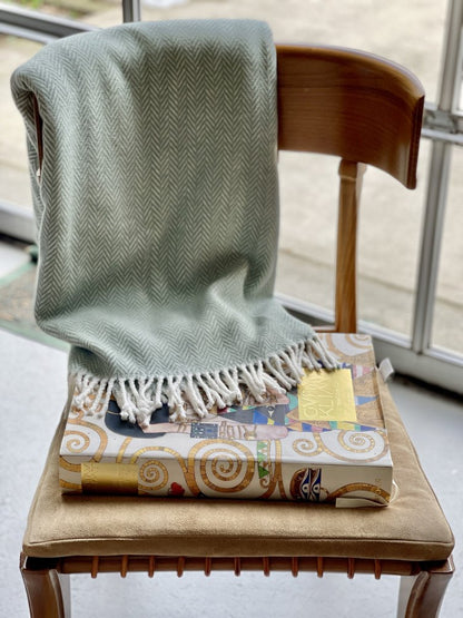 55" X 70" Sage and Ivory Woven Cotton Herringbone Plush Throw Blanket HomeRoots