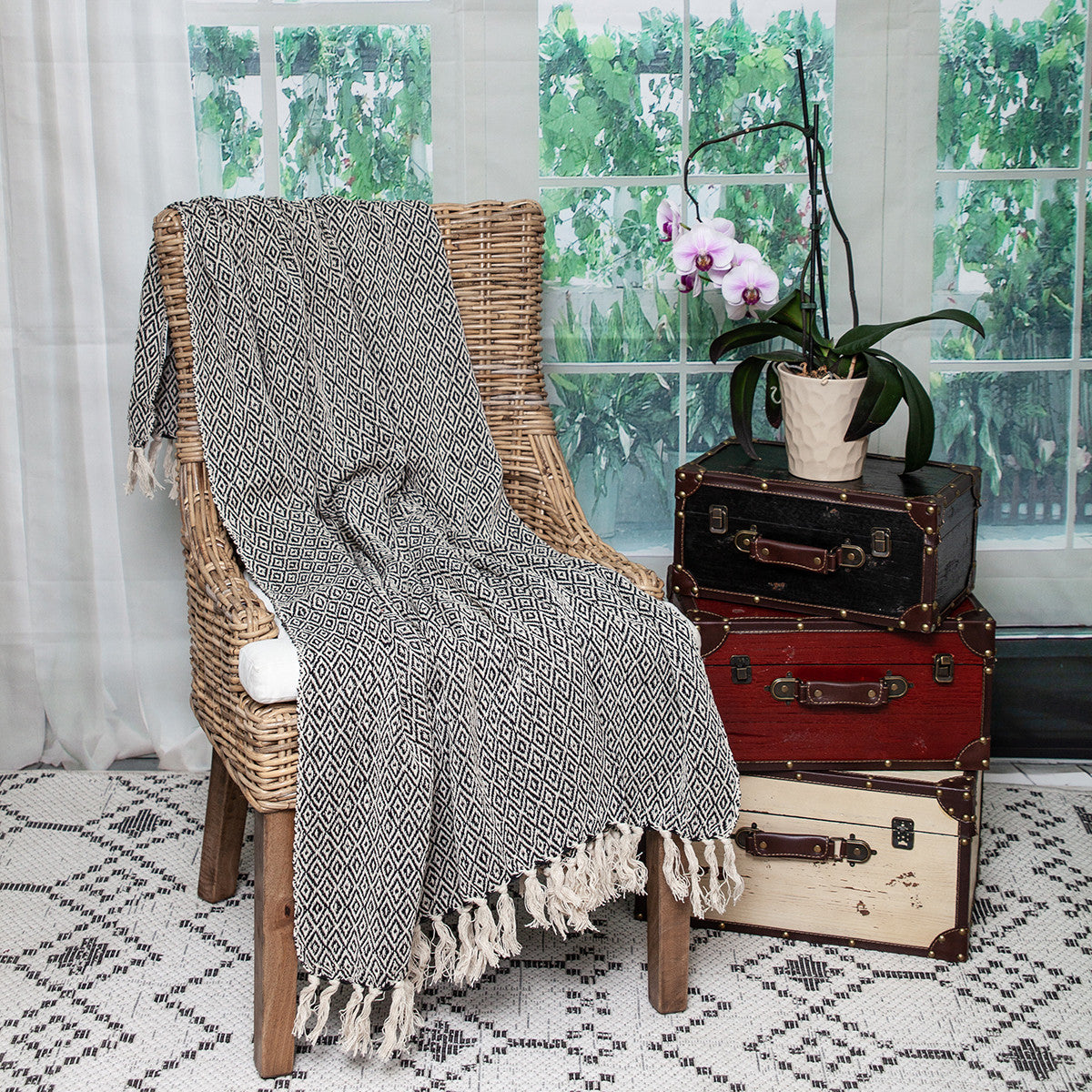 Boho Black and Beige Woven Diamond Pattern Throw with Tassels