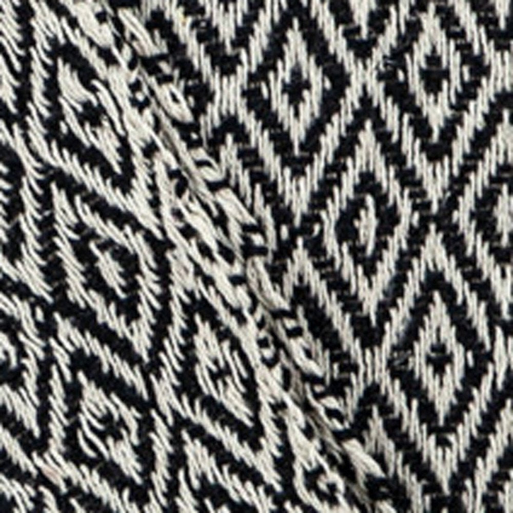 52" X 67" Black And Beige Geometric Diamond Throw Blanket with Tassels HomeRoots