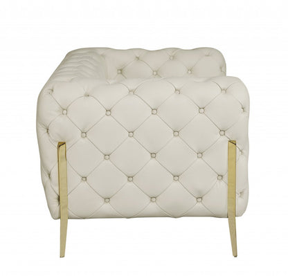 45" Beige And Gold Italian Leather Tufted Chesterfield Chair HomeRoots