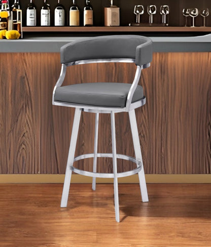 26" Gray and Silver Faux Leather and Iron Low Back Counter Height Swivel Bar Chair HomeRoots
