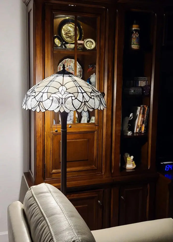 62" Dark Brown Two Light Torchiere Floor Lamp With White Fleur de Lis Glass Dome Shade HomeRoots