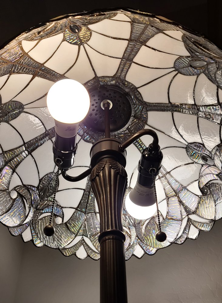 62" Dark Brown Two Light Torchiere Floor Lamp With White Fleur de Lis Glass Dome Shade HomeRoots