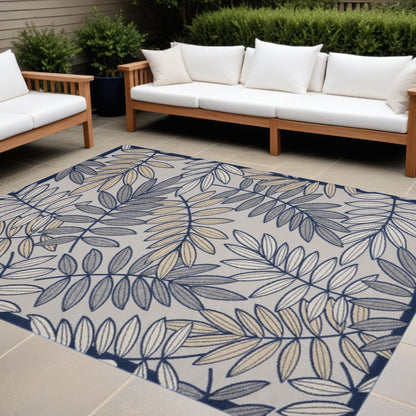 9' X 12' Ivory And Navy Floral Non Skid Indoor Outdoor Area Rug