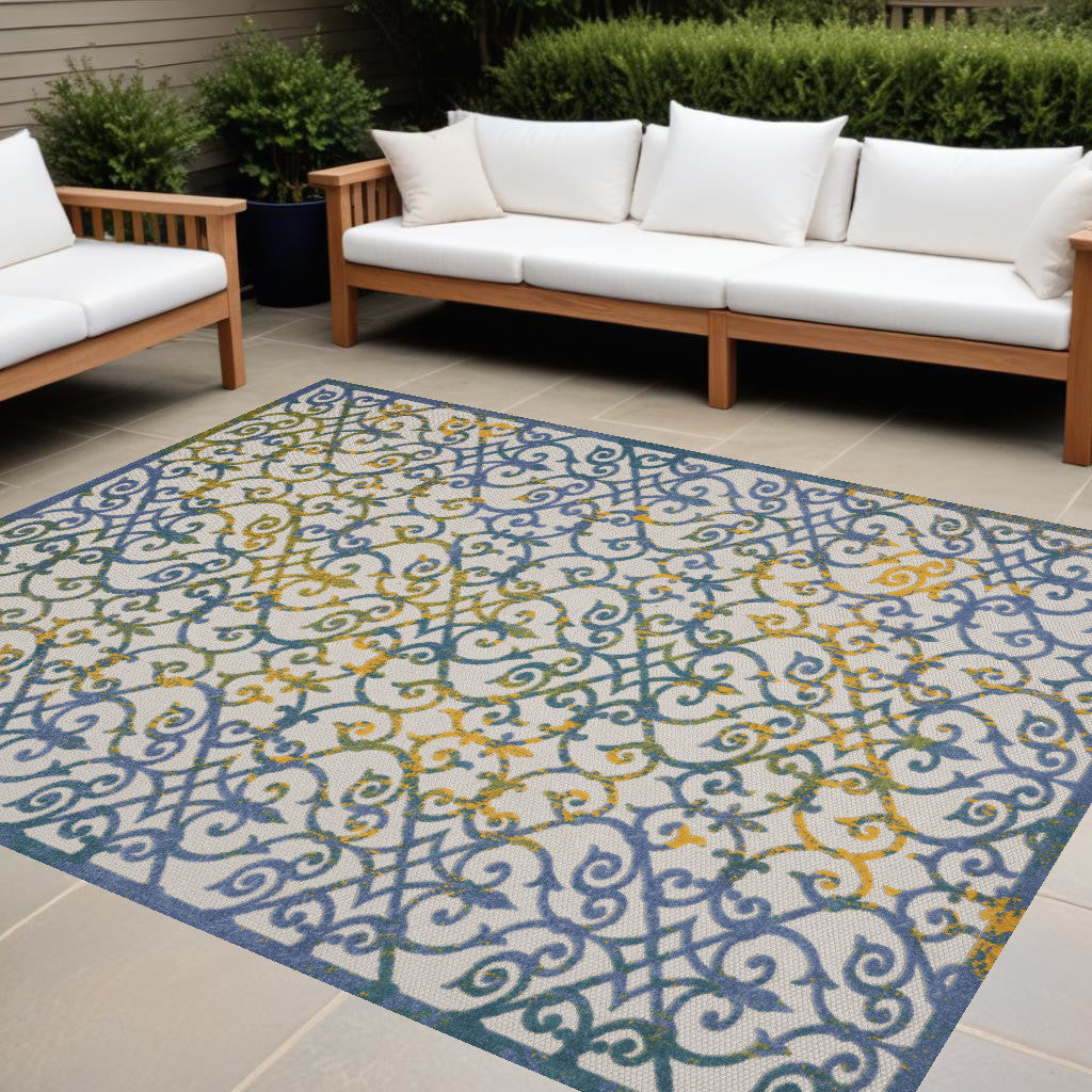 9' X 12' Ivory And Blue Damask Non Skid Indoor Outdoor Area Rug