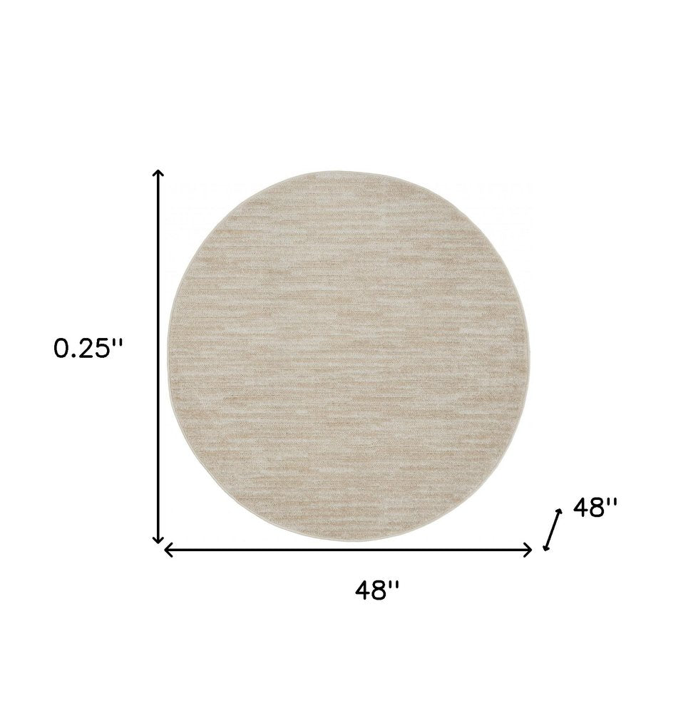 4' Beige And Ivory Round Indoor Outdoor Area Rug — view 1