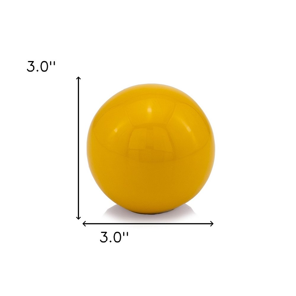 3" Yellow Aluminum Decorative Orb Tabletop Sculpture HomeRoots