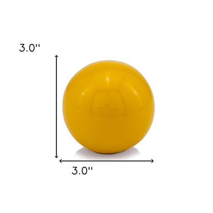3" Yellow Aluminum Decorative Orb Tabletop Sculpture HomeRoots