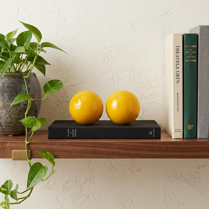 Set of Two Yellow Aluminum Decorative Orbs HomeRoots