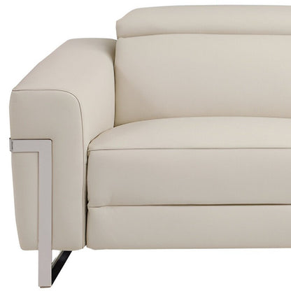 83" Beige Italian Leather USB Reclining Sofa With Silver Legs HomeRoots