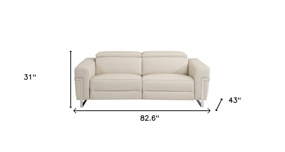 83" Beige Italian Leather USB Reclining Sofa With Silver Legs HomeRoots
