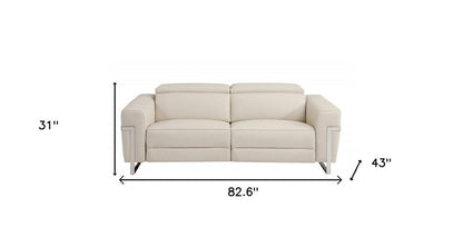 83" Beige Italian Leather USB Reclining Sofa With Silver Legs HomeRoots