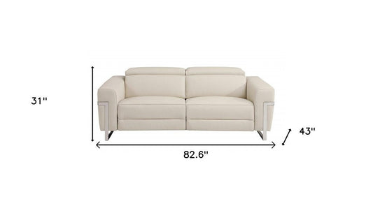 83" Beige Italian Leather USB Reclining Sofa With Silver Legs HomeRoots