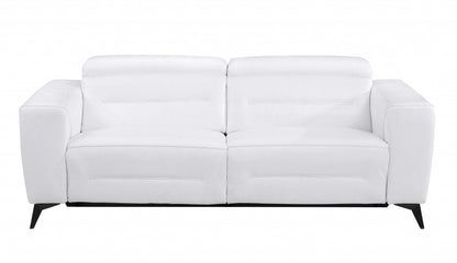 83" White Italian Leather USB Reclining Sofa With Black Legs HomeRoots