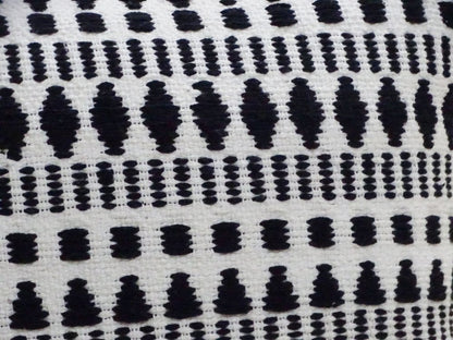 22" Black and White Southwestern Cotton Blend Throw Pillow With Tassels