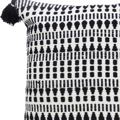 22" Black and White Southwestern Cotton Blend Throw Pillow With Tassels