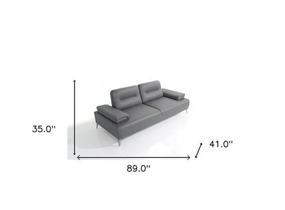 89" Light Gray Leather Convertible Sofa And Toss Pillows With Silver Legs HomeRoots