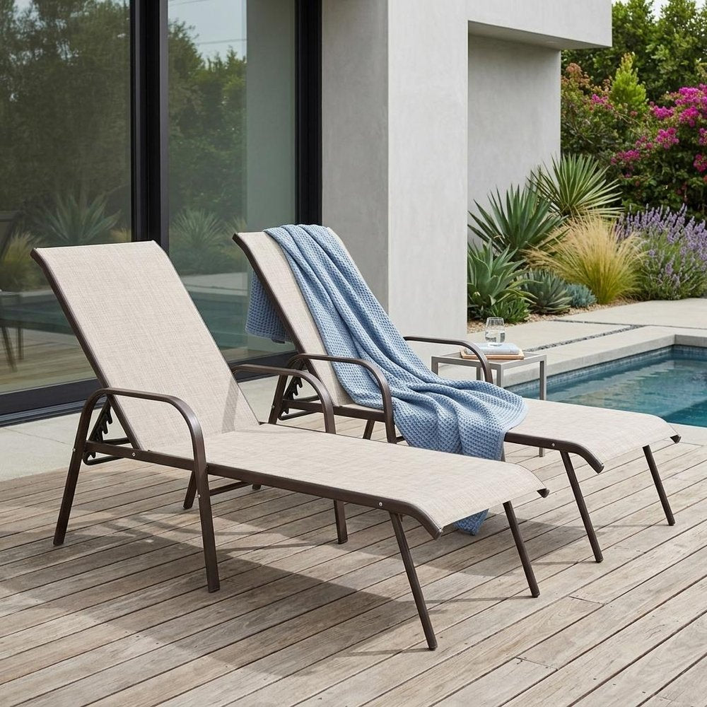 Set of Two Beige Steel Six Position Adjustable Sling Outdoor Chaise Lounges HomeRoots