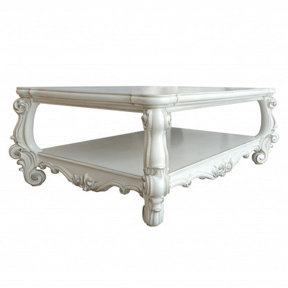 57" Antiqued White Wood Coffee Table With Shelf HomeRoots