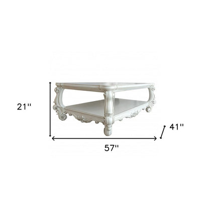 57" Antiqued White Wood Coffee Table With Shelf HomeRoots