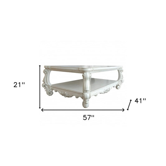 57" Antiqued White Wood Coffee Table With Shelf
