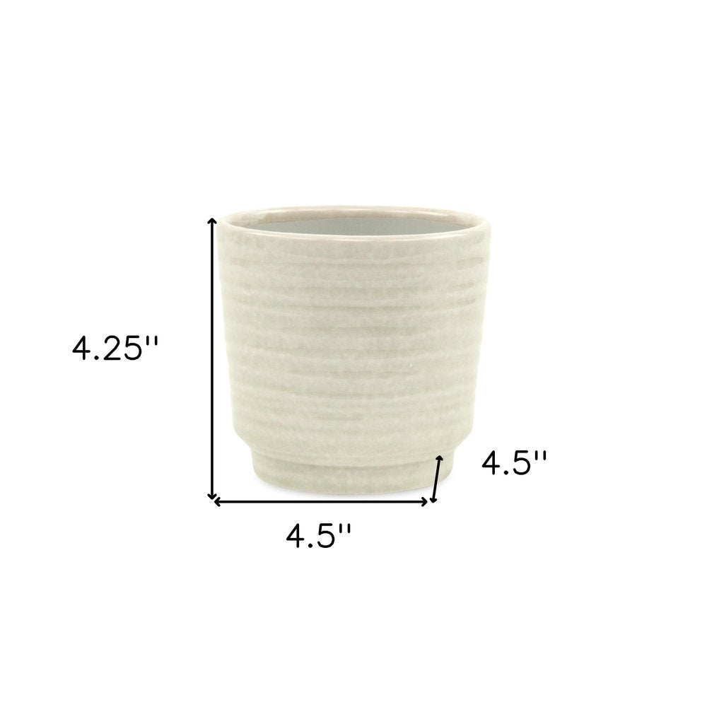 White Ceramic 23 Ounce Round Distressed Pot Planter HomeRoots