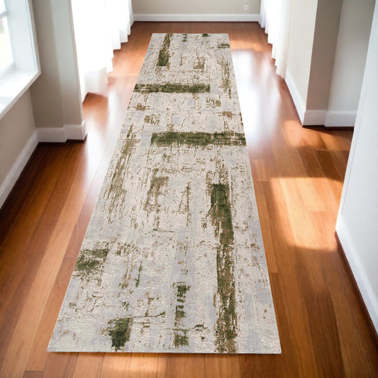 10' Green and Ivory Abstract Power Loom Distressed Runner Rug - 27.0" (L) x 120.0" (W) x 0.6" (H)