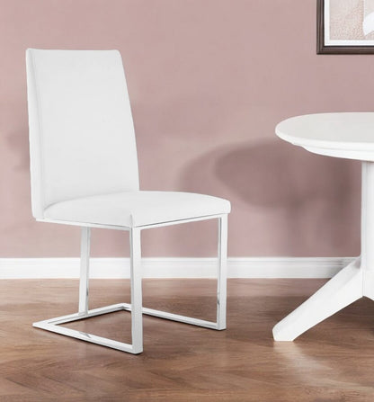 White And Silver Upholstered Faux Leather Dining Side Chair HomeRoots
