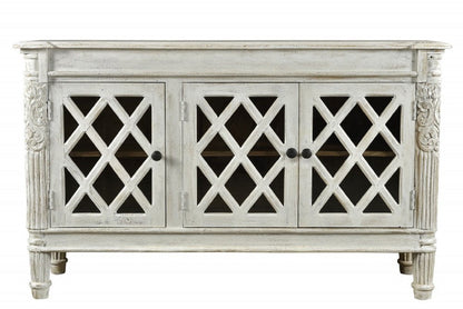 58" White Distressed Solid Wood Carved Scrollwork Sideboard with Three Glass Doors HomeRoots
