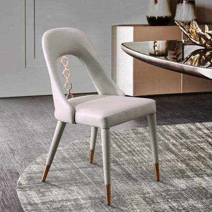 Set of Two Light Gray Faux Leather Dining Side Chairs With Rose Gold Accents HomeRoots