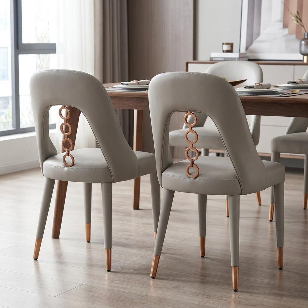 Set of Two Light Gray Faux Leather Dining Side Chairs With Rose Gold Accents HomeRoots