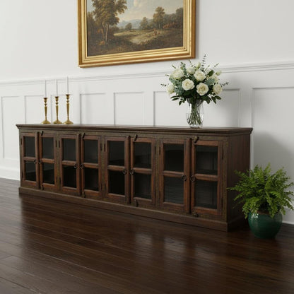 118" Brown Distressed Solid Wood Carved Abstract Buffet Table with 8 Glass Doors HomeRoots
